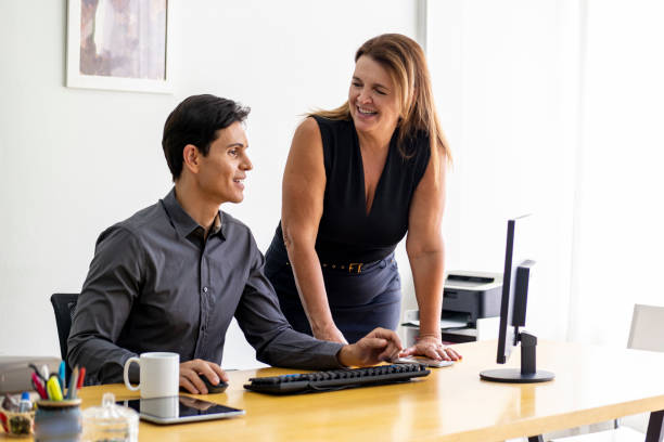 istock Man and woman in a office. 1272505047