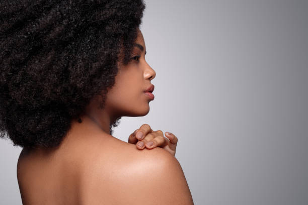 istock Beautiful ethnic woman touching shoulder 1272506712