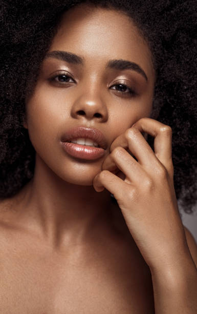 istock Beautiful black female with makeup 1272506716