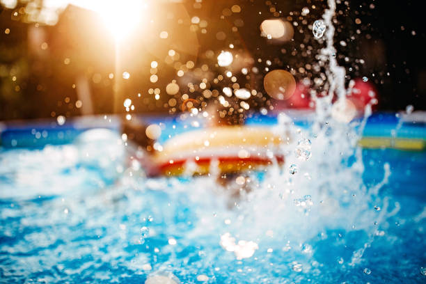 water splashes - above ground pool imagens e fotografias de stock