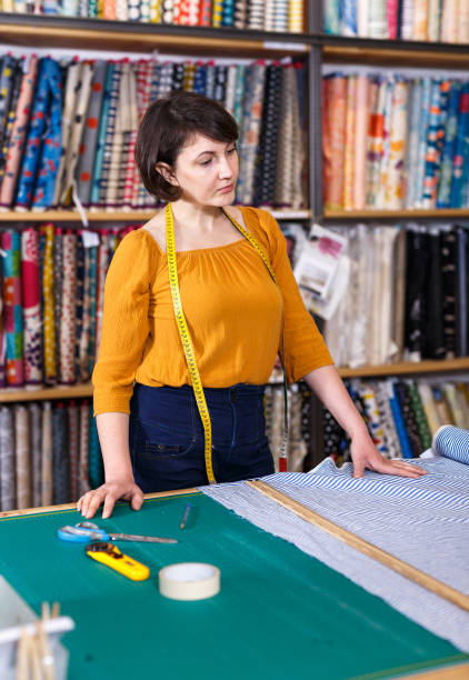 istock Female owner of fabric store 1272509705