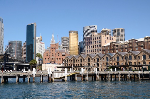 View of Sydney skyline from Campbells Cove showing ASN Co. Campbell's Stores, Metcalfe Bond and skyscrapers including Ernst & Young, Marriott Hotel and Westfield Tower. Campbells Cove wharf is in the foreground