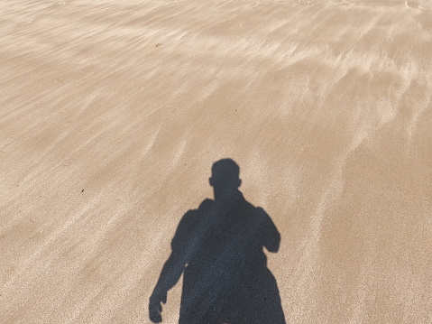 Man shadow in the desert