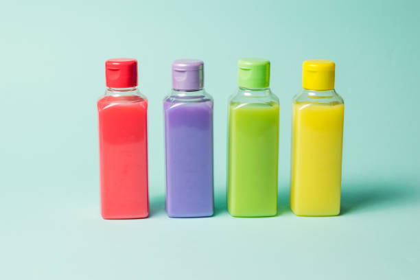 istock Set of colorful plastic bottles on a light background. 1272523413