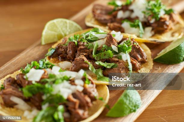 Three Carne Asada Mexican Street Tacos In Corn Tortilla With Lime Stock Photo - Download Image Now