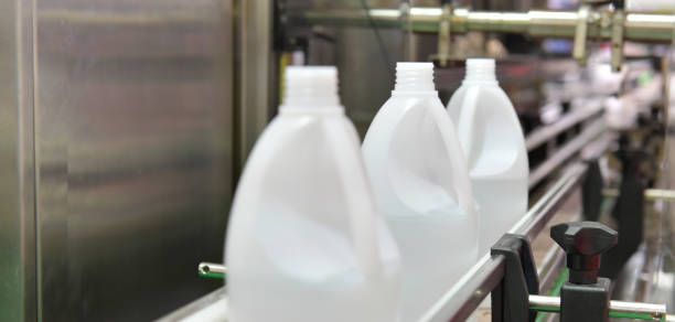 istock White plastic Bottles transfer on Automated conveyor systems industrial 1272538592
