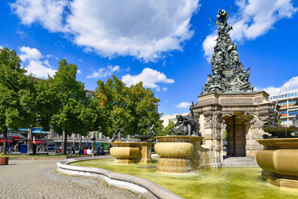 Mannheim, Germany -  Town square called 'Paradeplatz' wifountain city center of Mannheim Mannheim, Germany - September 2020: Town square called 'Paradeplatz' with Fountain called 'Grupello Pyramid' in city center of Mannheim on a sunny day mannheim photos stock pictures, royalty-free photos & images