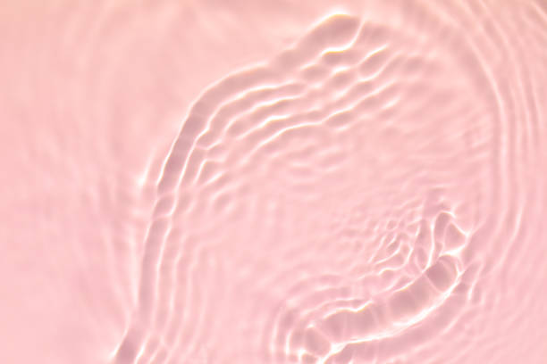 istock pink transparent clear water surface texture summer background 1272541006