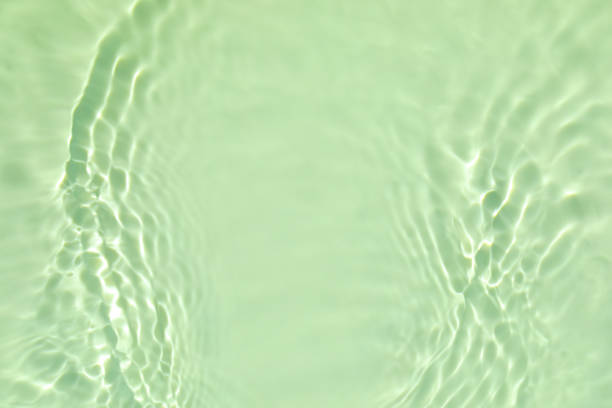 istock green transparent clear water surface texture summer background 1272541683