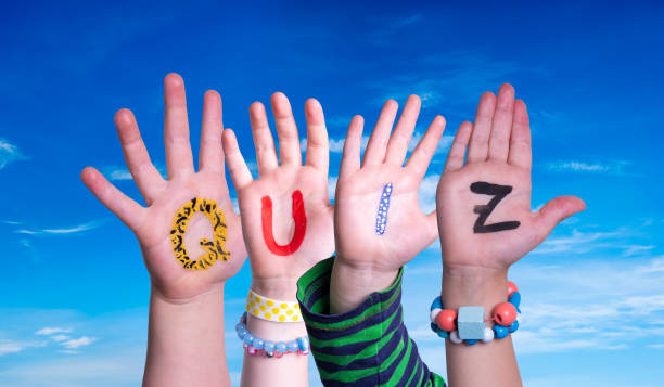 istock Children Hands Building Word Quiz, Blue Sky 1272542771