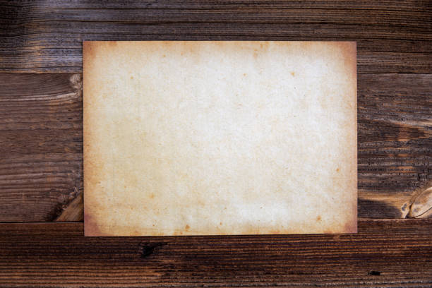 istock Old White Parchment Paper, Copy Space, Wooden Background 1272542975