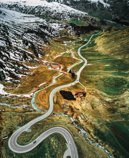 istock winding road in switzerland 1272546168