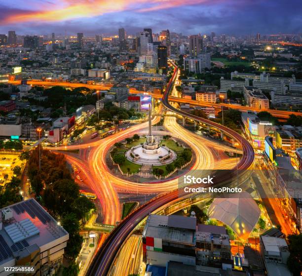 Victory Monument Thailand In Bangkok City With Sunset And Building Background Stock Photo - Download Image Now