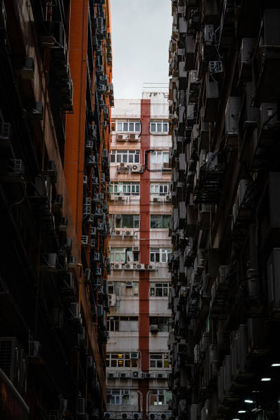 istock Back alley in factory area 1272552549