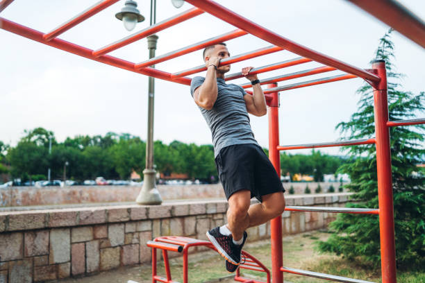 Street workout and very muscular young caucasian man.