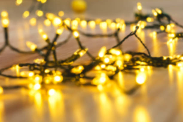 istock Garland glowing with warm light on floor. 1272554739