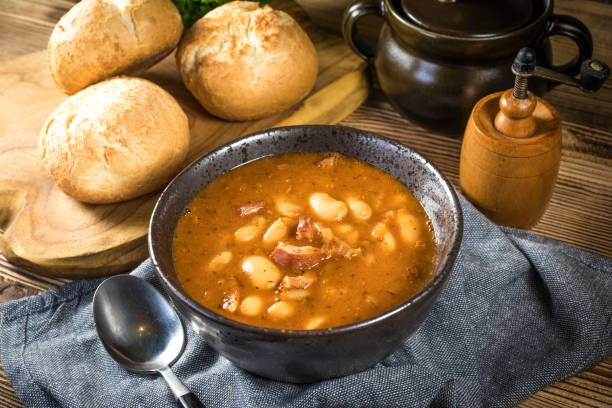 istock Beans with tomato sauce, bacon and sausage. 1272555514