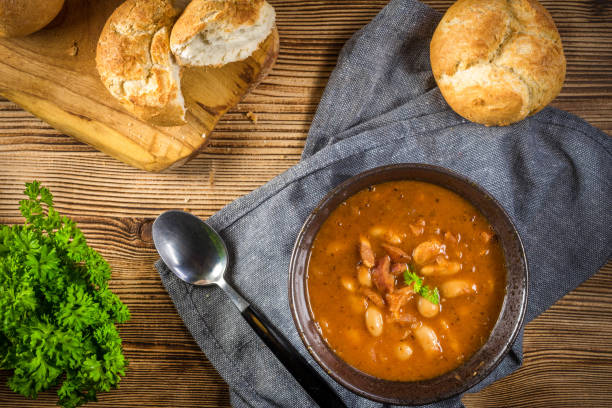 istock Beans with tomato sauce, bacon and sausage. 1272555568