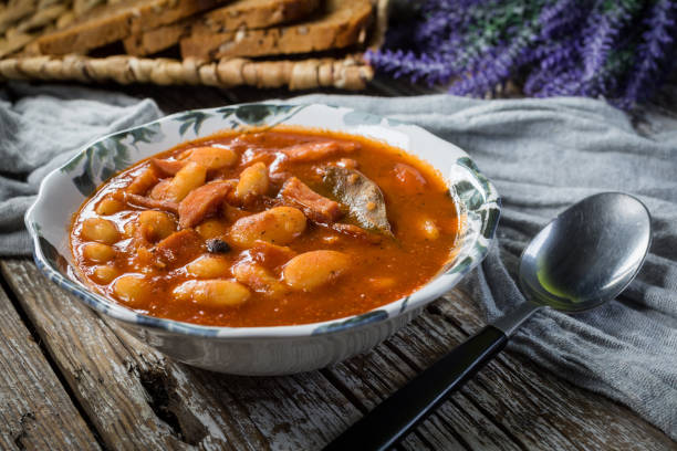 istock Beans with tomato sauce, bacon and sausage. 1272555981
