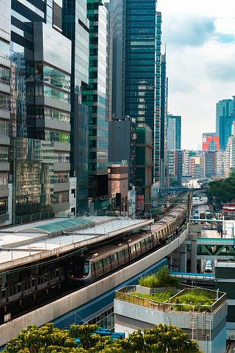 Kwun Tong, Hong Kong, the Green Line MTR train entering Kwun Tong Station.