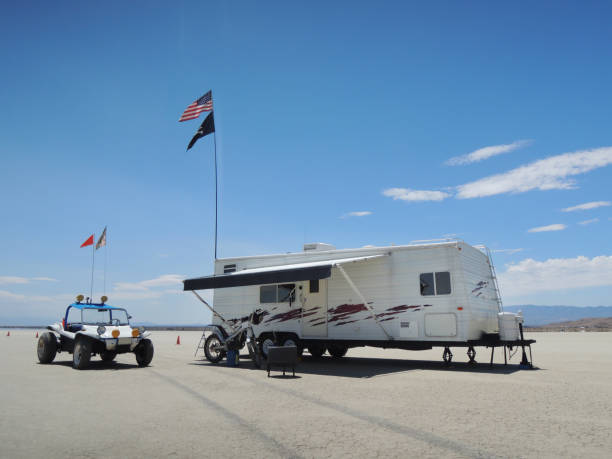 Off road buggy & motorcycle & caravan trailer at El Mirage Lake Off road buggy & motorcycle & caravan trailer at El Mirage Lake RV truck stock pictures, royalty-free photos & images