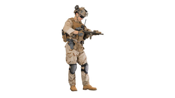 istock Soldier in camouflage gear checking his uniform and ammunition o 1272557787