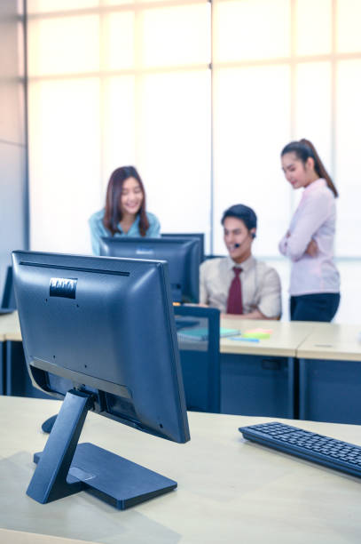 istock Colse up computer monitor and headset  at office. 1272560295