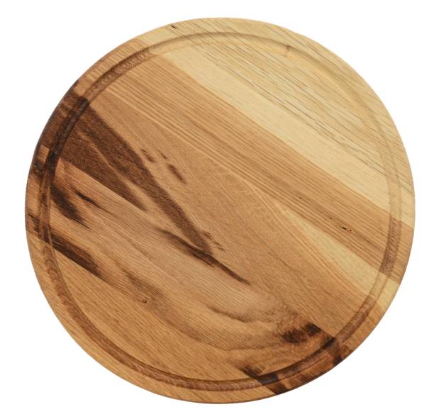 istock Wooden cutting board isolated on a white background 1272560920