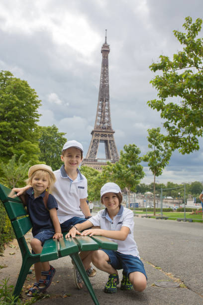 istock Happy family with children, visiting Paris 1272564757