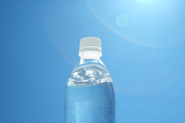 istock PET bottle, blue sky and green 1272564791