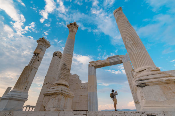 Traveller tourist photographer is taking photo in ancient ruins of Laodicea on the Lycus , Pamukkale UNESCO, Roman Empire, Camera, Laodikeia, Greek architecture travel destinations 20s adult adventure stock pictures, royalty-free photos & images