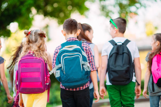 istock Group of kids going to school together. 1272567766