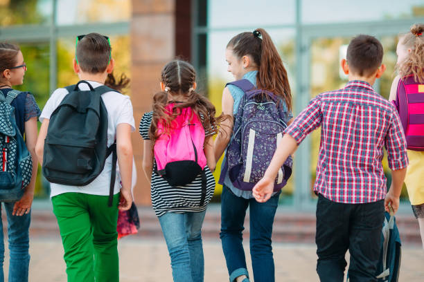 istock Group of kids going to school together. 1272567934