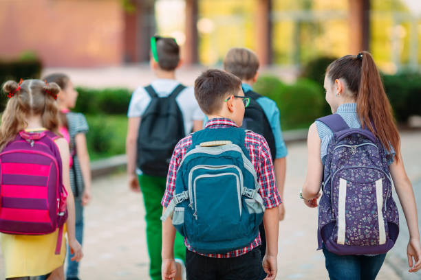istock Group of kids going to school together. 1272568966