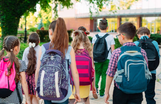 istock Group of kids going to school together. 1272568993
