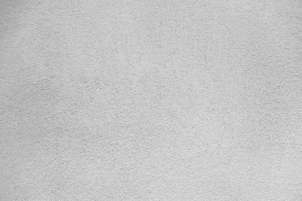 istock Old grunge abstract background texture White concrete wall 1272569639