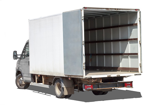 Freight truck with blank side container ready for  branding. Isolated white truck.
