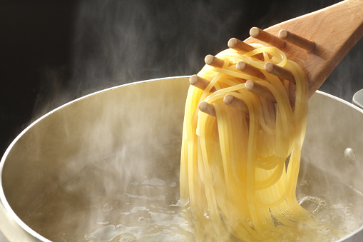 Pasta, boil, steam, tongs, scoop, boiled, close-up, kitchen, lunch, spaghetti, hot water, copy space, pot, noodles