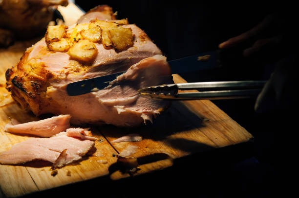 istock a man cut a roasted chicken on wood cutting board ready to served for dinner party reception 1272572210