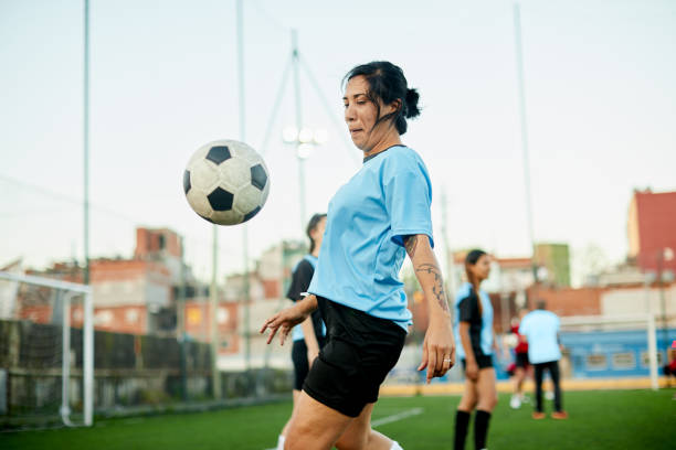 istock A female soccer player controlling a ball at a training. 1272572521