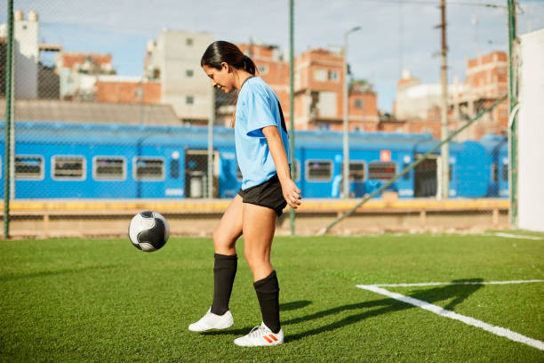 istock A female soccer player controlling a ball at a training. 1272572522