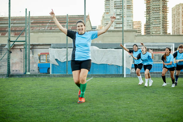 istock A woman soccer player celebrating a goal. 1272572523