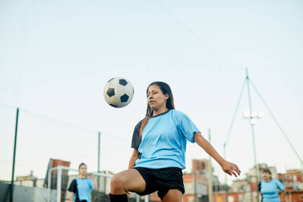 istock A female soccer player controlling a ball at a training. 1272572538