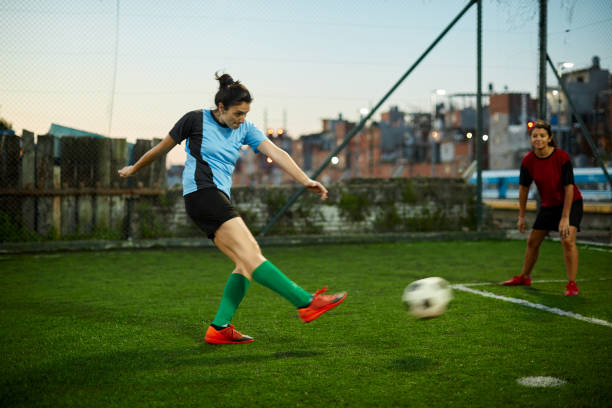 istock A female soccer player striking a goal at a training session. 1272572545