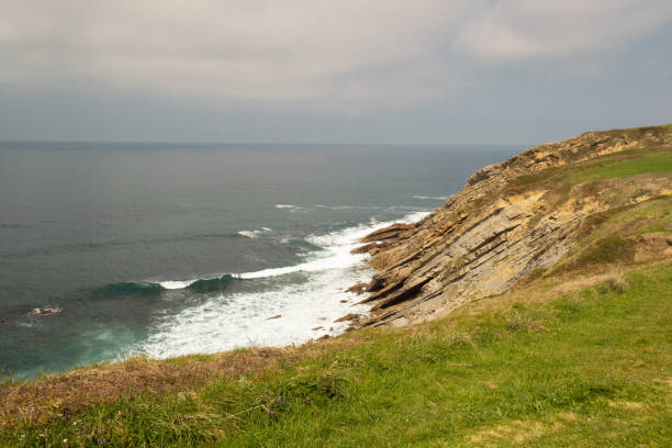 istock Cliffs in the sea with a cloudy sky. Cantabrian coast in the Atlantic Ocean. 1272574555