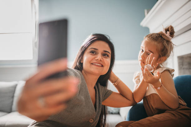 istock Mother and daughter are getting dressed to go out 1272574854