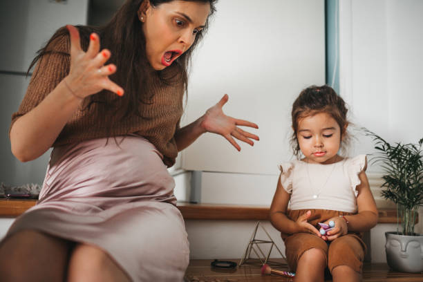 istock Naughty Girl With Her Mother 1272574859