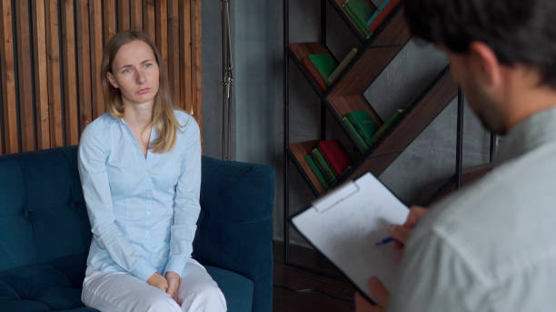 istock A mental health professional takes notes when a patient talks about problems while sitting on the couch 1272577030