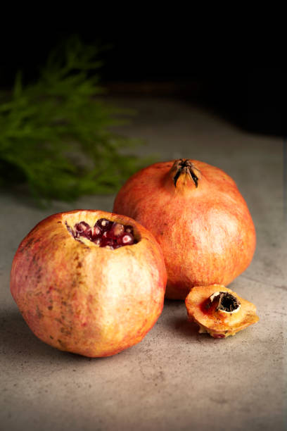 istock Pomegranate whole and open. Still life 1272577687