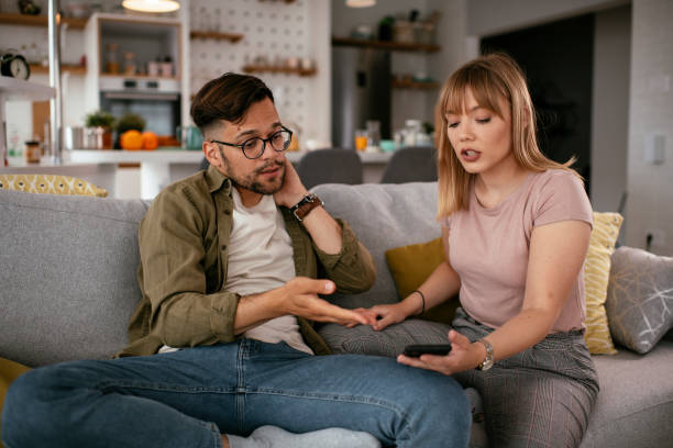 istock Boyfriend and girlfriend are arguing on the couch. 1272580123